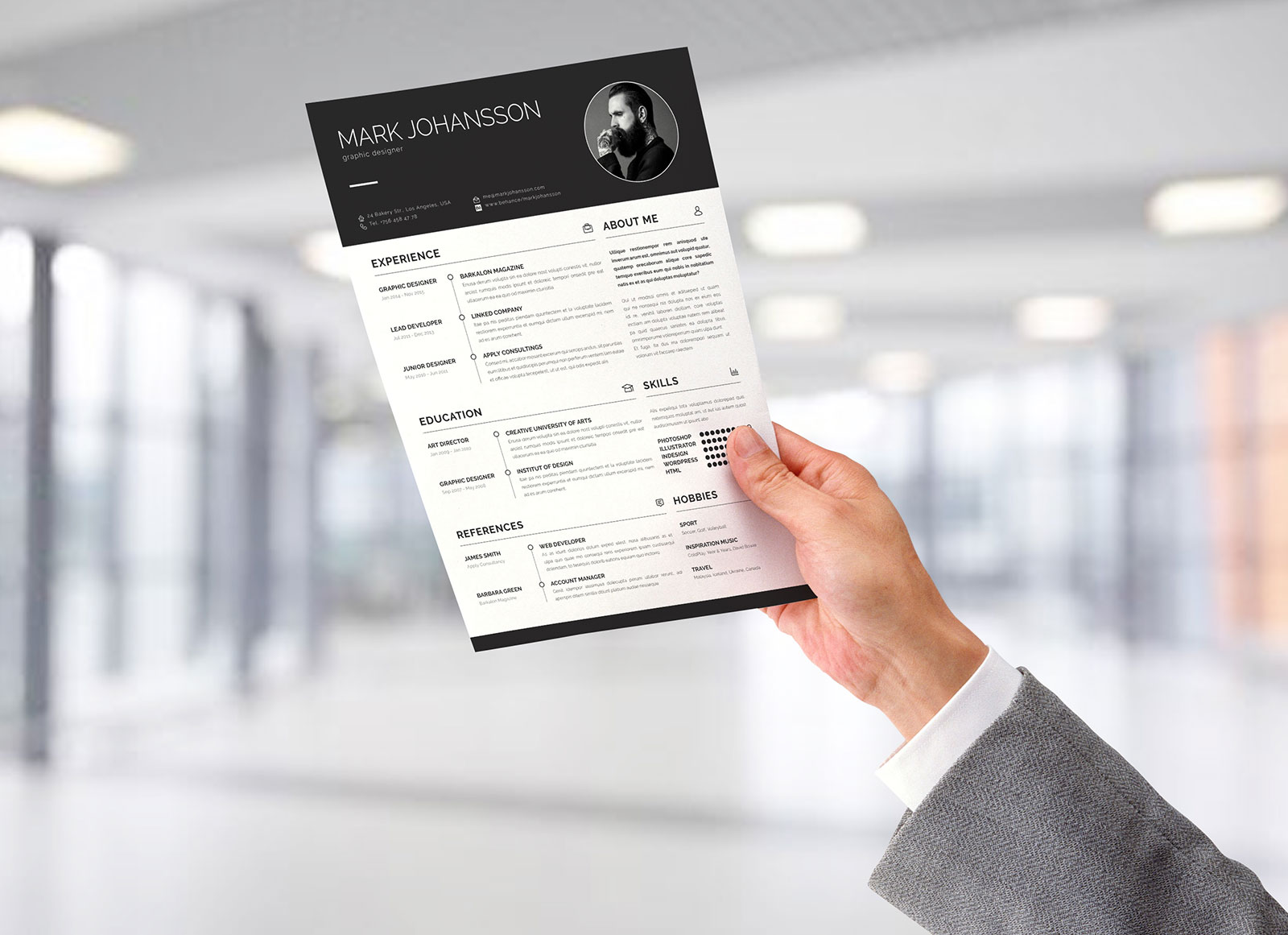 Free A4 Resume Flyer in Male Hand Mockup PSD