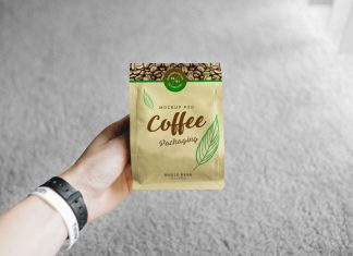 Free-Hand-Holding-Coffee-Packaging-Mockup-PSD