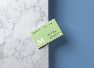 Free Business Card On The Edge Of Surface Mockup PSD