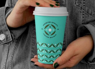 Free-Hand-Holding-Large-Coffee-Cup-Mockup-PSD