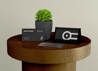 Free Business Card Stand On Table Mockup PSD
