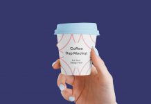 Free-Hand-Holding-Small-Coffee-Cup-Mockup-PSD
