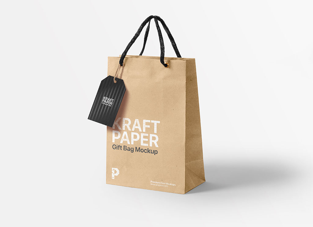 Free Kraft Paper Gift Shopping Bag With Handing Tag Mockup ...