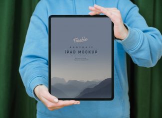 Free-Hand-Holding-iPad-Pro-Mockup-PSD