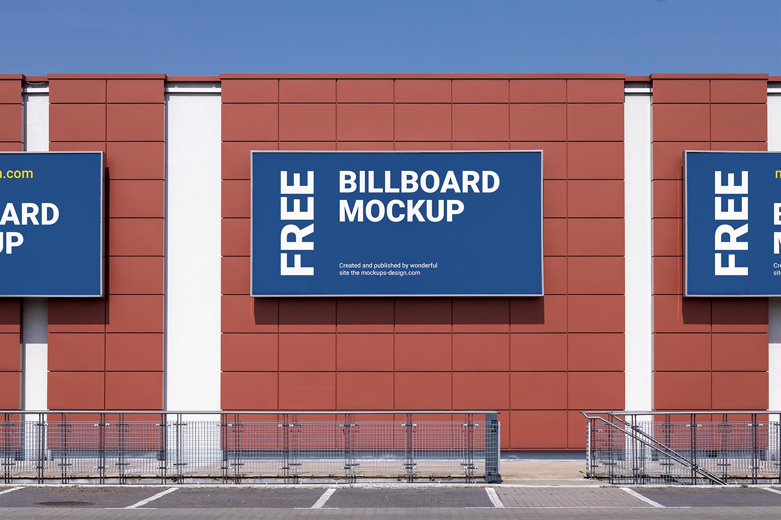 Free_Billboard_on-Building-Wall-Mockup-PSD