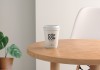 Free-Paper-Coffee-Cup-On-Wooden-Table-Mockup-PSD