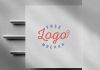 Free Letterpressed White Paper Logo Mockup PSD