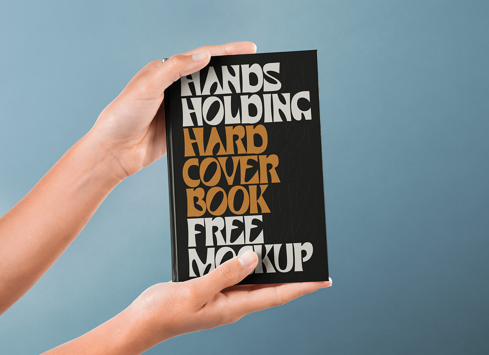 Free Hand Holding Hardcover Book Mockup PSD
