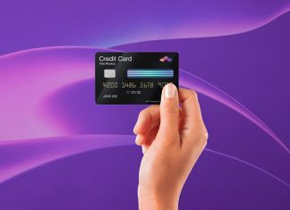 Free Hand-Holding-Credit-Card-Mockup PSD