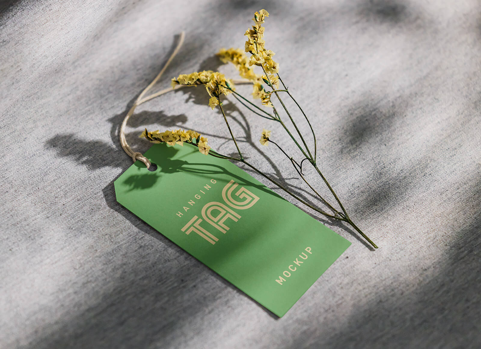 Free Yellow Flower Hanging Tag Mockup PSD