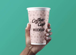 Free Hand Holding Paper Coffee Cup Mockup PSD