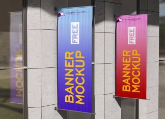 Free-Wall-Mounted-On-Building-Vertical-Banner-Mockup-PSD