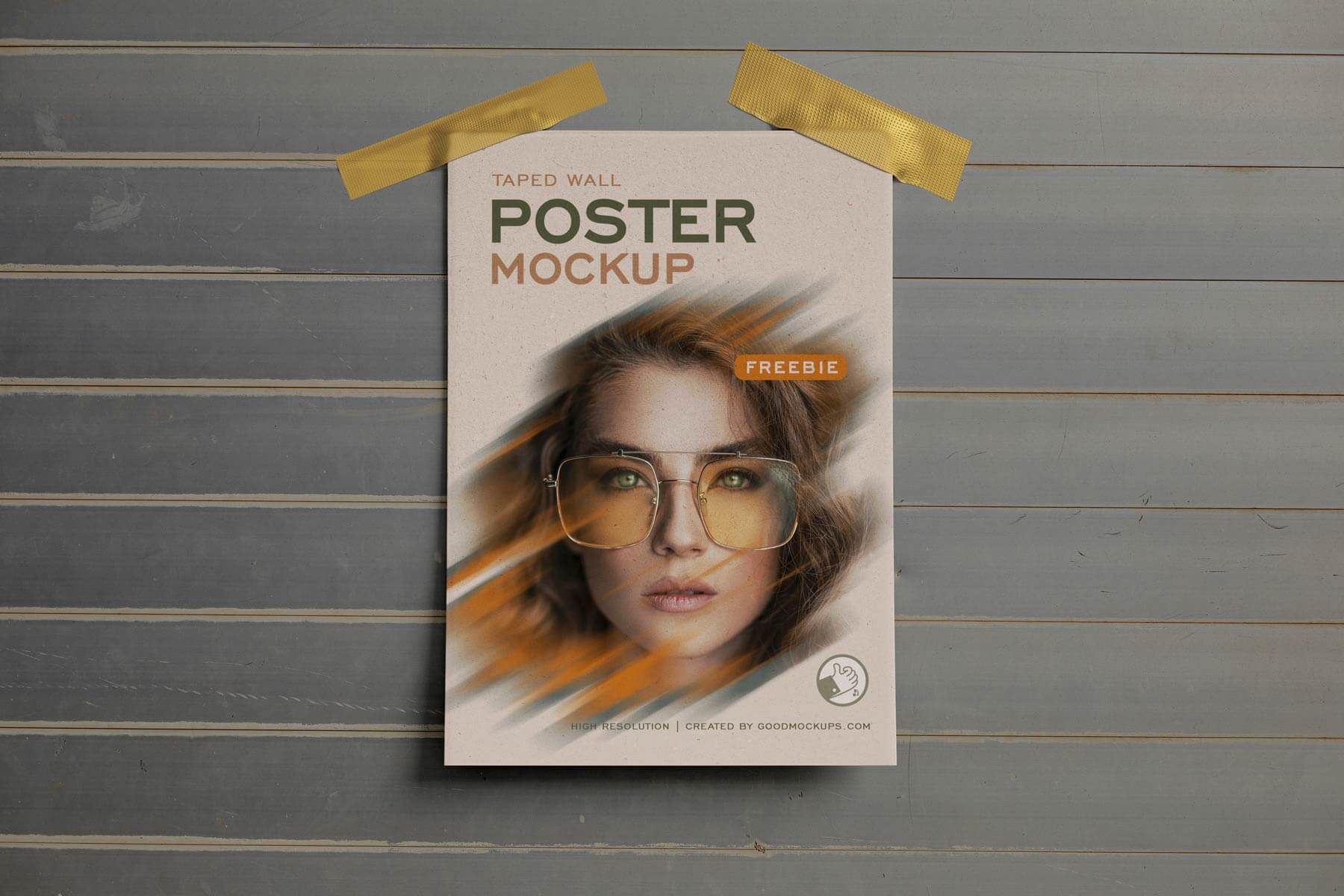Free-Taped-Poster-On-Wall-Mockup-PSD