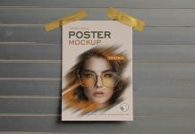 Free-Taped-Poster-On-Wall-Mockup-PSD
