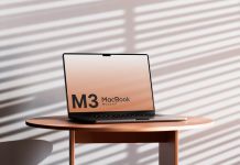 Free M3 MacBook Pro On Desk Mockup PSD