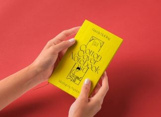 Free-Hand-Holding-Cotton-Cover-Notebook-Mockup-PSD