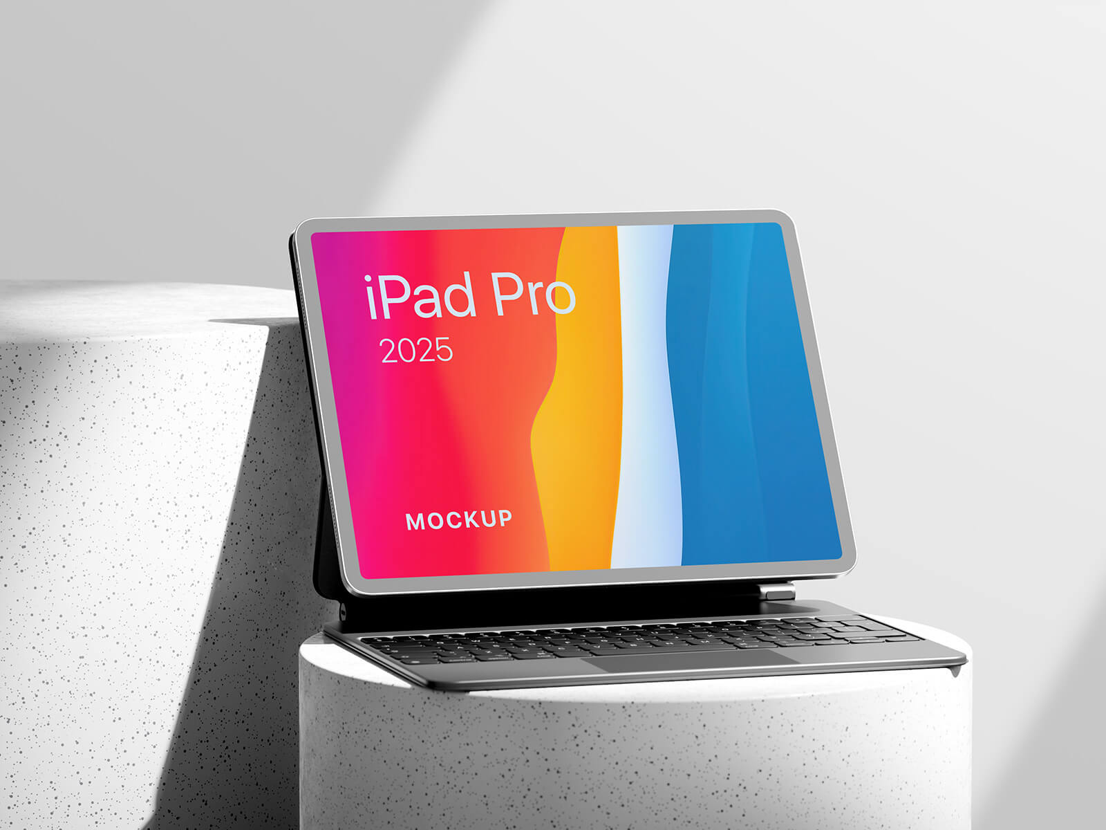 https://mockupnest.com/ipad-pro-with-magic-keyboard-mockup-on-podium/