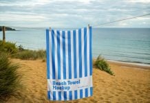 Free Hanging Beach Towel Mockup PSD