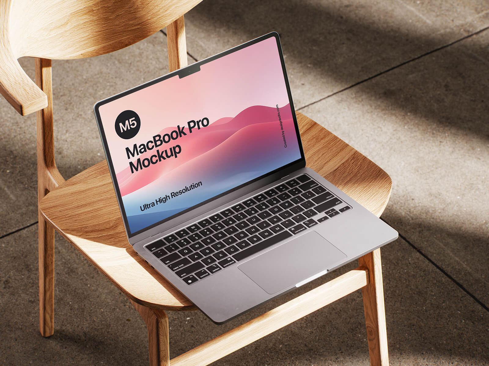 Free M5 MacBook Pro Mockup PSD Set With Wooden Chair