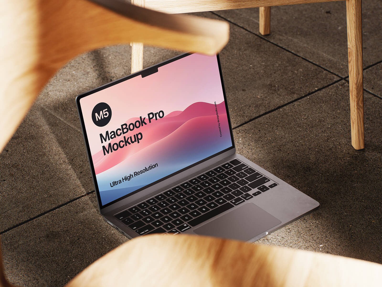 Free M5 MacBook Pro Mockup PSD Set With Wooden Chair
