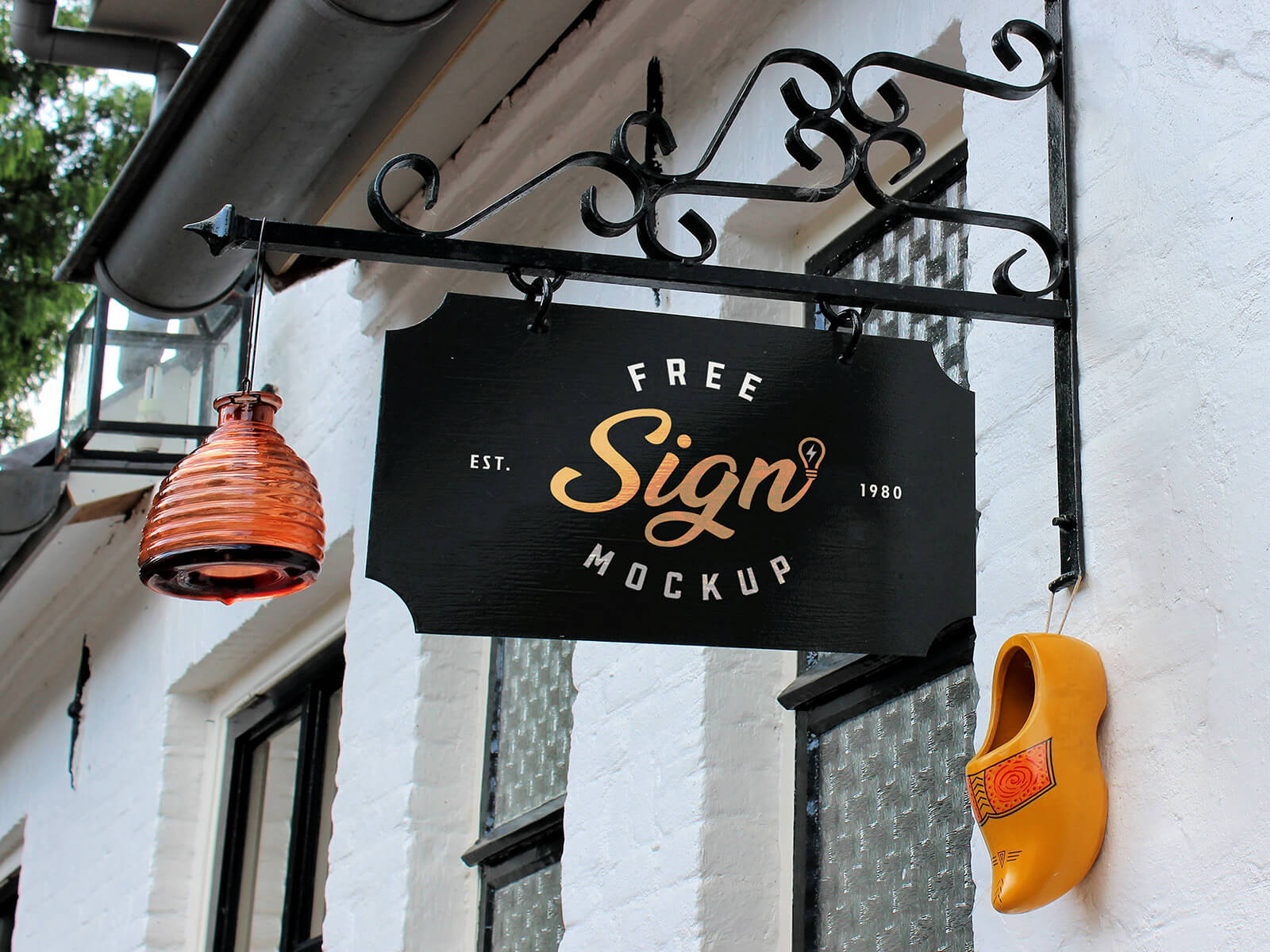 Free-Dutch-Restaurant-Black-Signboard-Mockup-PSD