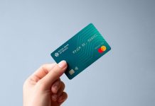 Free Hand-Holding Bank Credit Card Mockup PSD