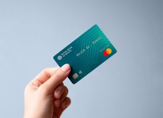 Free Hand-Holding Bank Credit Card Mockup PSD
