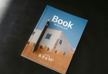 Free-Hi-Res-Paperback-Book-Title-With-Pen-Mockup-PSD