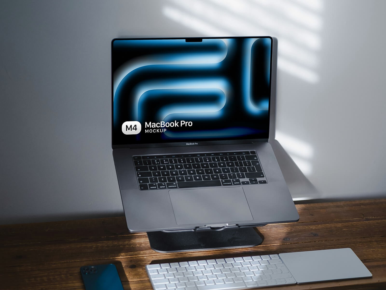 Free MacBook Pro on Stand Mockup PSD