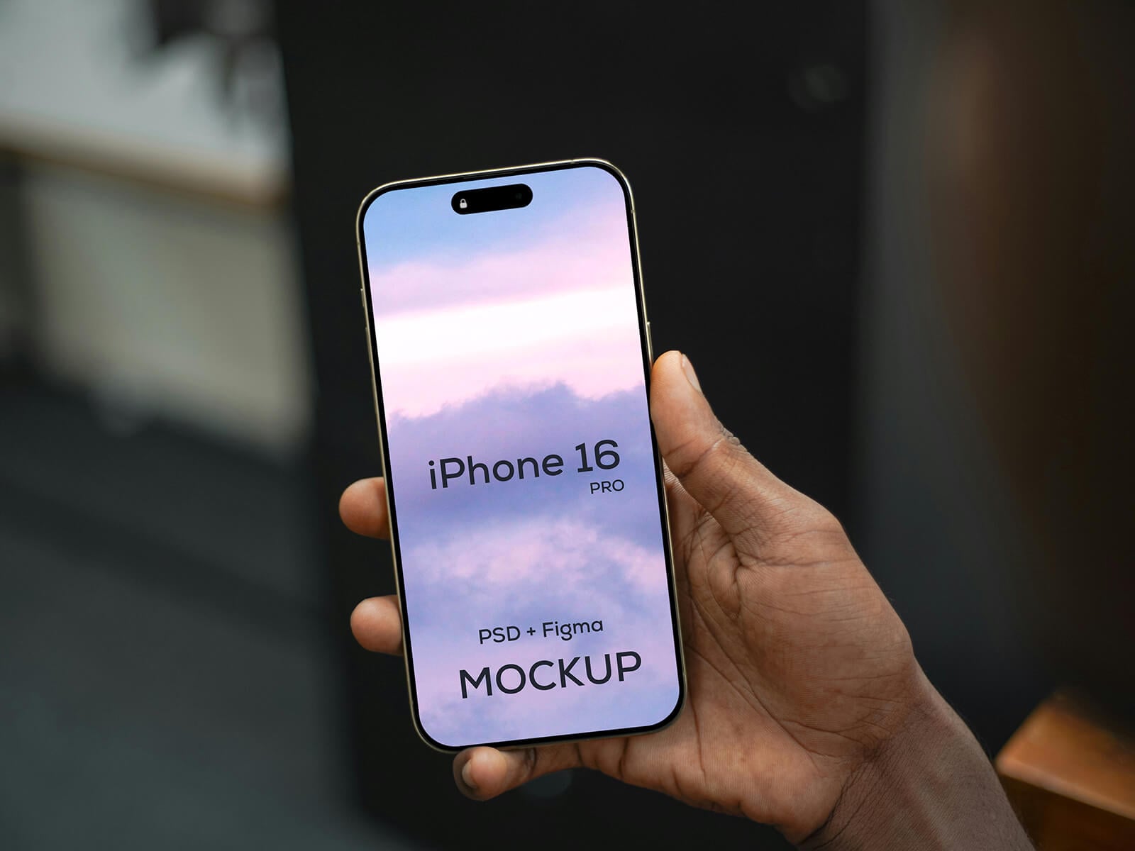 Free Hand Holding iPhone 16 Pro Mockup (PSD+Figma)