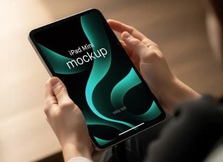 Free Hand-Holding iPad Mini Mockup PSD