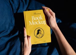 Free Woman Holding Holding Book Mockup PSD