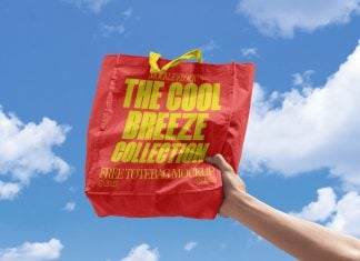 Free Hand-Holding Tote Shopping Bag Mockup PSD