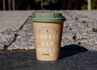 Free Paper Cup on Sidewalk Mockup PSD