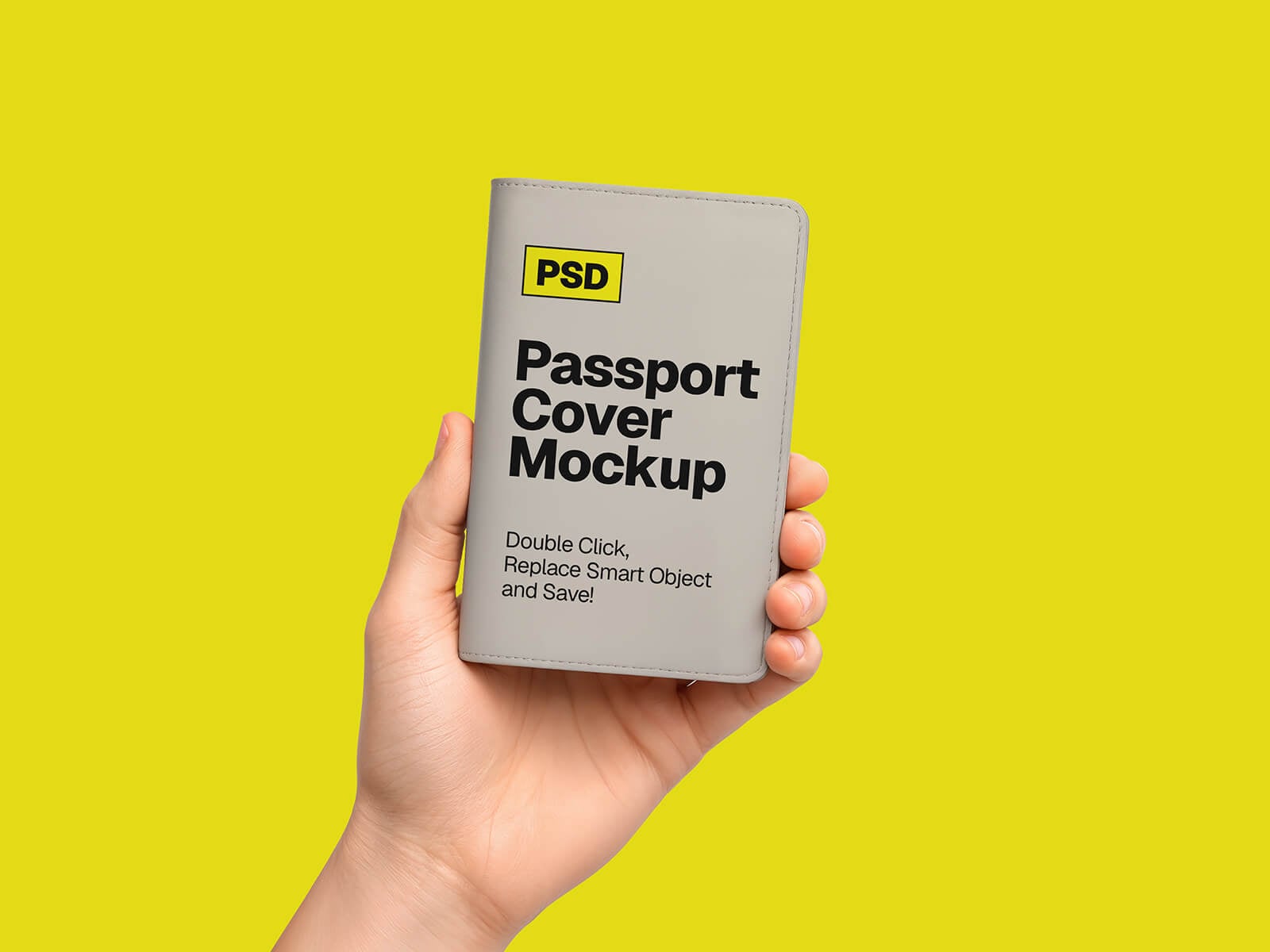 Free Hand-Held Passport Booklet Cover Mockup PSD