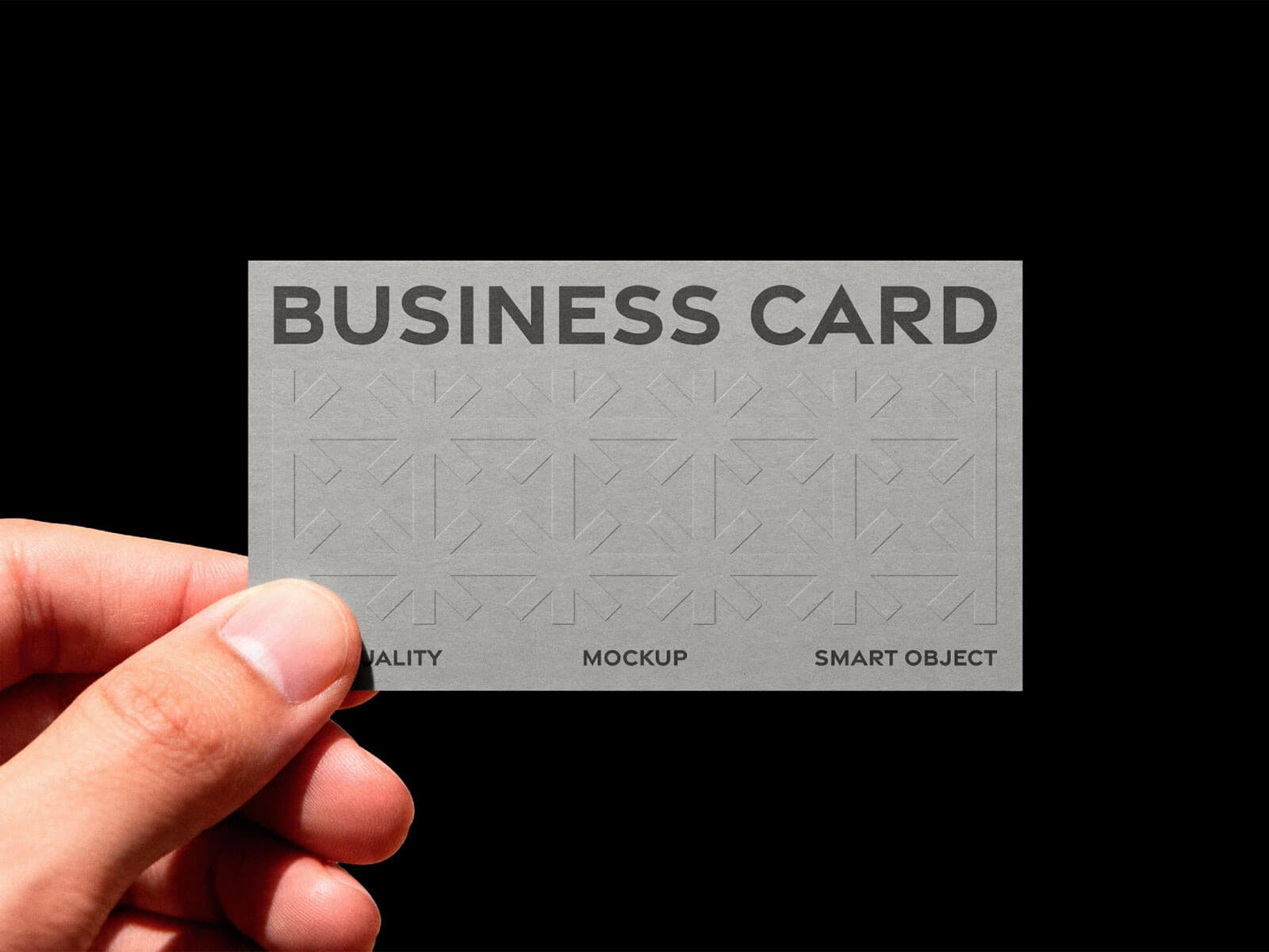 Free Embossed Textured Hand-Holding Business Card Mockup PSD