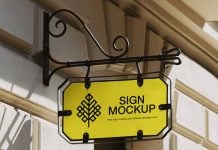 Free Antique Wrought Iron Scroll Bracket Sign Mockup PSD