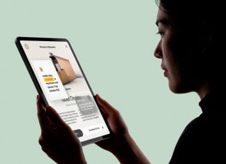 Free-Woman-in-Silhouette-Hand-Holding-iPad-Pro-Mockup-PSD